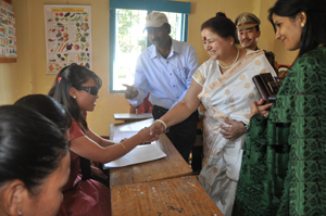 >First Lady of Arunachal Pradesh Smti Jyotsna Sharma interacting with visually impaired students at Donyi Polo School for Hearing and Visually Impaired, Chimpu, Itanagar on 4th December 2013